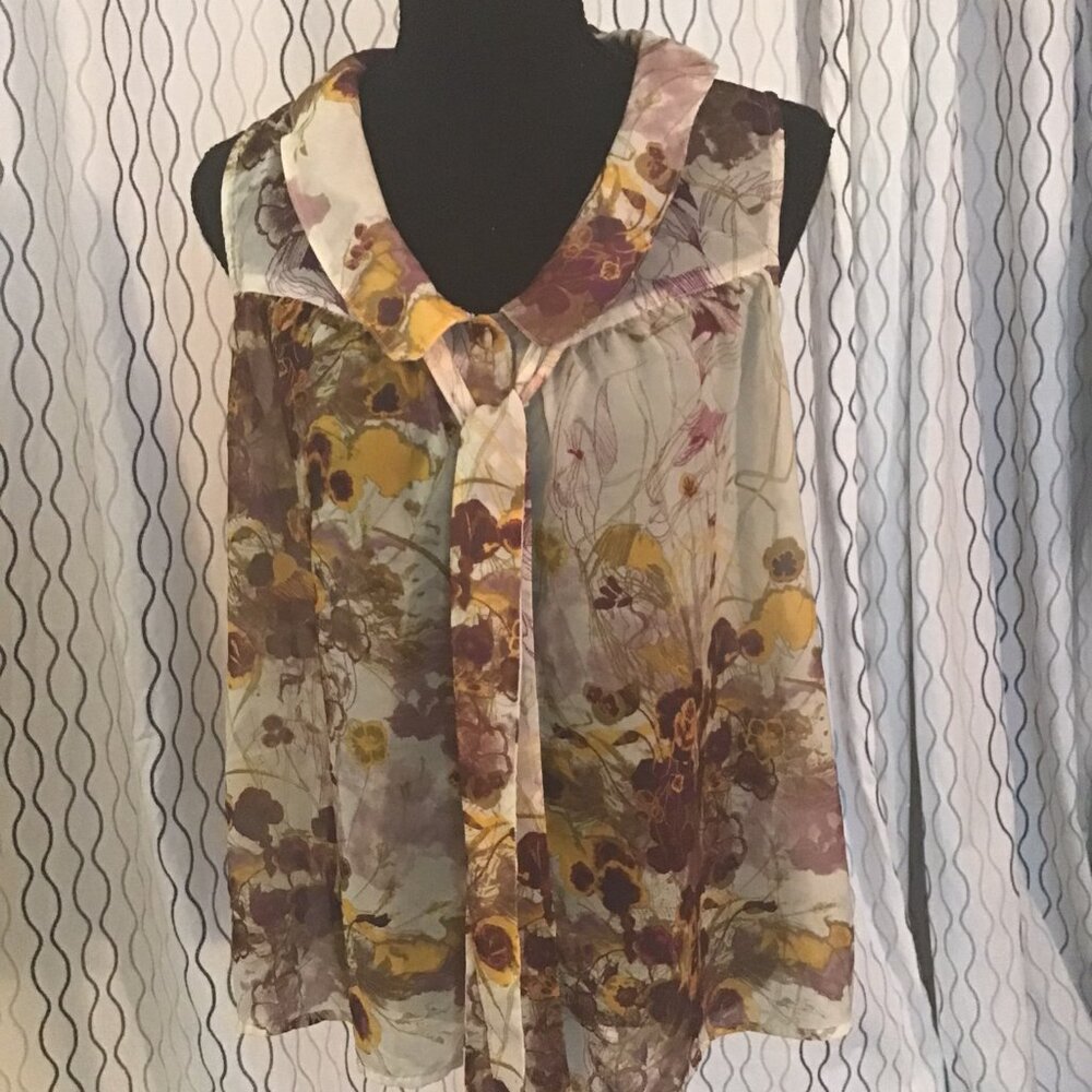 Button down sleeveless top